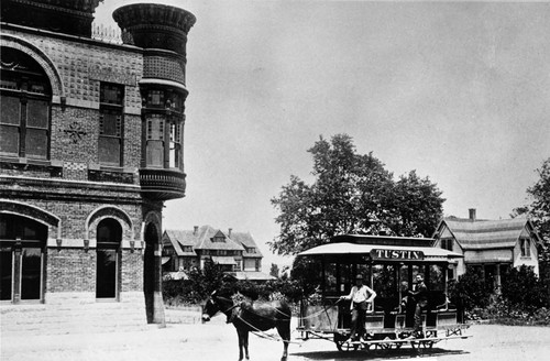 Horse car at intersection of Main and D Streets in front of Tustin First National Bank, ca. 1895