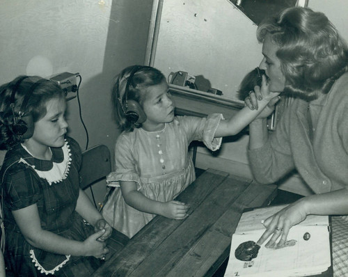 Bobbi Oswald teaching hearing-impaired children