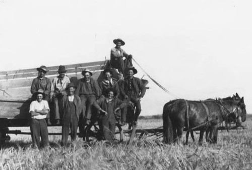 Farm workers and wagon