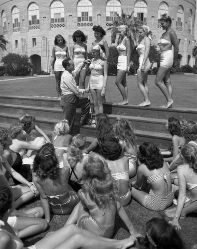 Taking measurements, school for beauty pageant contestants, Catalina Island, June 1948