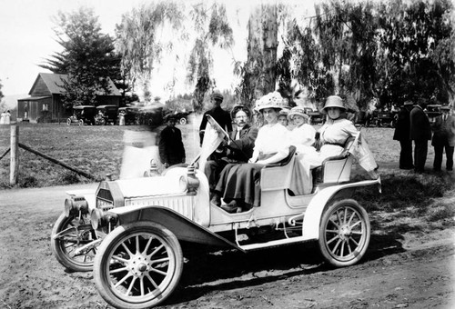 Santa Ana photographer Edward Cochems and family at Escondido Grape Day, Escondido, 1912