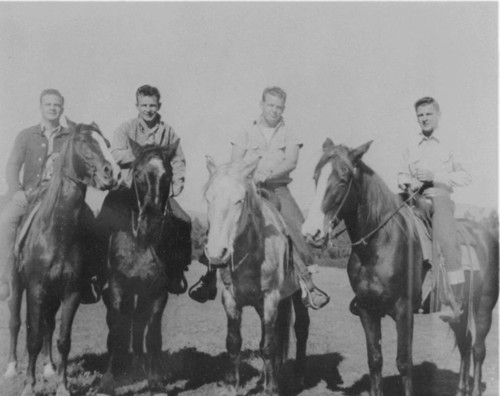 The Chandler brothers on horseback