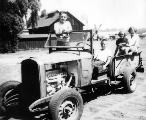 Children with jalopy pickup truck on the Irvine Ranch