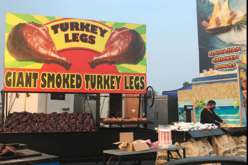 Turkey leg vendor at OC Fair's "Fair Food Drive Thru"