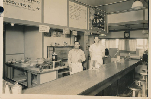 Hirum Harlow (left) and unidentified man at Cafe on Doheny Park Rd., Capistrano Beach, 1930's