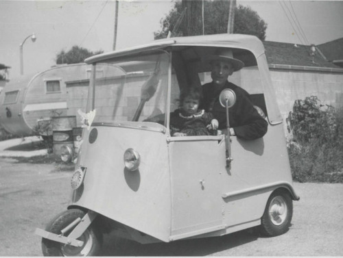 Sam Hennig in his autoette in Huntington Beach, 1963