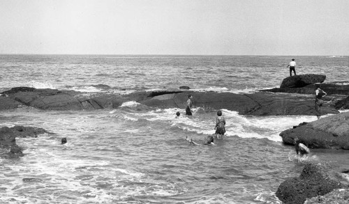 Bathing and fishing at the rocks, Corona del Mar