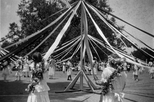 Children with flowers at the Maypole celebration, Tustin Grammar School, ca. 1916