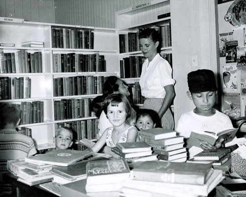 Phyllis Changala and children at El Toro Country Store Library