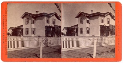 Stockton: (Large house with picket fence.)