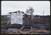 AUG81P3-32: "HONK FOR MED-FLY MAN 500 ft" sign, freeway signs