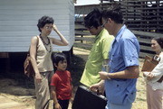 Harriet Tropp, John Victor Stoen, Jim Jones, Carolyn Layton and an Unidentified Guest, Jonestown, Guyana