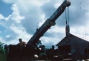 [Jonestown residents showing heavy agricultural equipment]