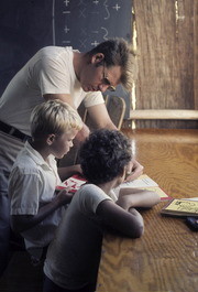 Tom Grubbs (Standing, Center) with Ronnie Beikman and Martin Amos in Schoolroom, Jonestown, Guyana