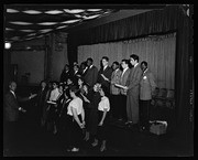 Leo Christiansen conducting chorus at California Labor School Foreign Policy Conference