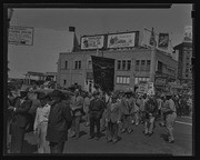 Group carrying National Union of Marine Cooks and Stewards banner in ILWU Sears Strike, California Labor School