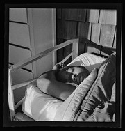 Joe Johnson sleeping in bed, California Labor School