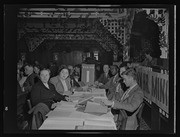 People sitting at Region One table at FTA 7th National Convention, California Labor School