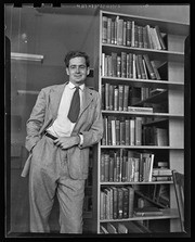 George Hitchcock leaning on bookcase, California Labor School