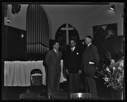 Herbert Aptheker [left], Holland Roberts [right], and unidentified man at church meeting, California Labor School