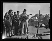 Performers singing on back of flatbed truck, San Francisco, Calif., California Labor School