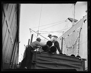 Men working on waterfront, California Labor School