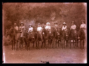 Nine people on horses