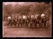 Nine people on horses