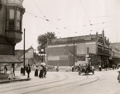 Stockton - Streets - c.1910 - 1919: Main St. and San Joaquin St. razing Rosenbaum and Crawford building