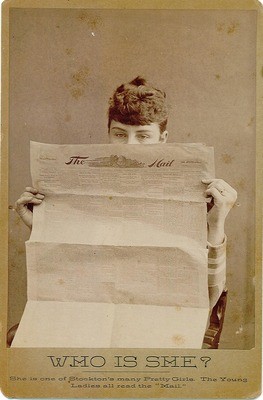 Advertising - Stockton: Woman reading the newspaper from The Mail