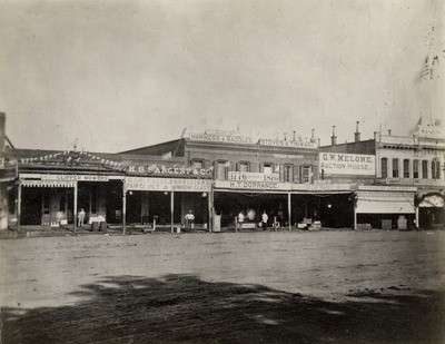 Stockton - Streets - 1880s: Hunter St. H.S. Sargent Groceries, Dorrance Harness, G.W. Melone Auction House