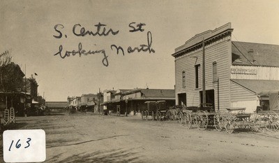 Stockton - Streets - 1850s - 1870s: Center St. looking north, San Joaquin Stable E. F. Beswick