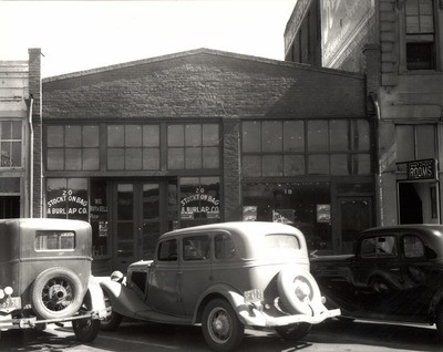 Stockton - Streets - c.1930 - 1939: Stockton Bag & Burlap Co. and What Cheer Rooms, E. Weber Ave