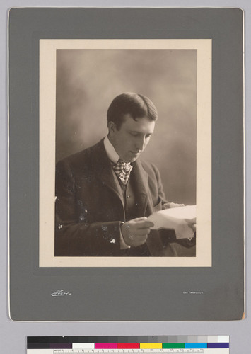 Portrait of William Randolph Hearst, Sr. reading a letter