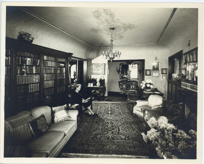 Mrs. Clara Chapman in the library, 1946