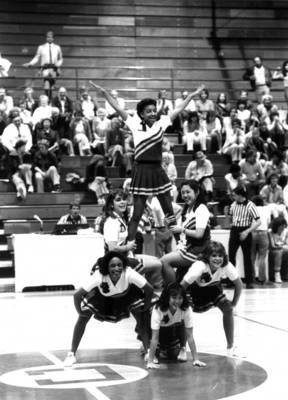 Cheerleaders form a stack, Chapman College, Orange, California, 1984