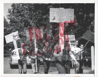 Anti-integrationists Holding Signs