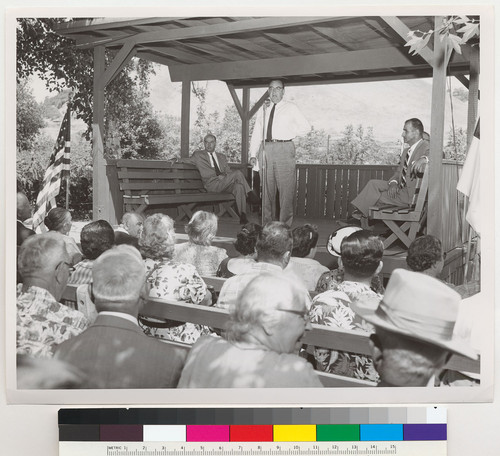 Edmund G. Brown giving a speech on a deck during his campaign for governor