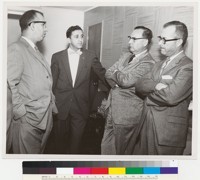 Edmund G. Brown with three men