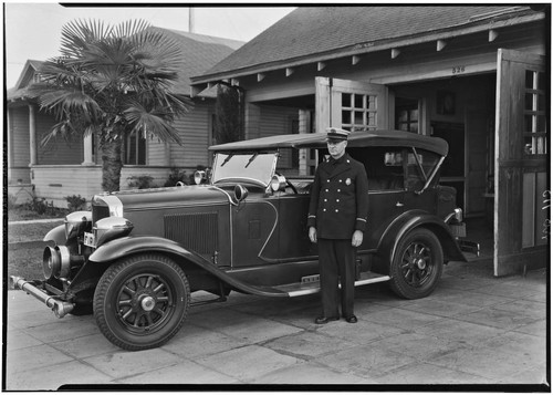 Captain outside Station No. 3, 526 E. Anaheim