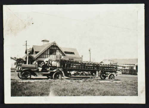 1912 Seagrave tractor and American-La France trailer in front of Station No. 4, 4th and Loma