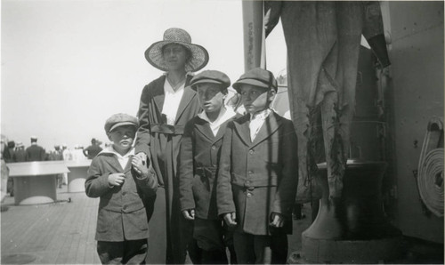 Ernest Buss, Helen Buss (aunt), Charley Emerson, and Claude Emerson at San Pedro, California