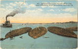 Log Rafts of five million feet each, 900 feet long, depth 28 feet below Waterline, in Harbor, San Diego, Cal