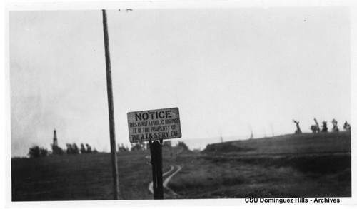 Sign at railroad crossing