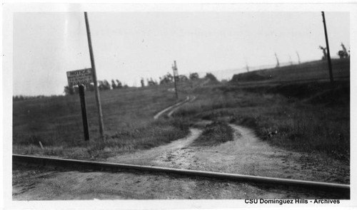 Sign at railroad crossing