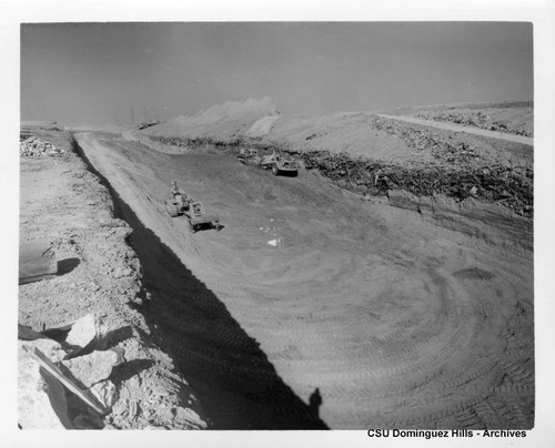 Bulldozers at dump site