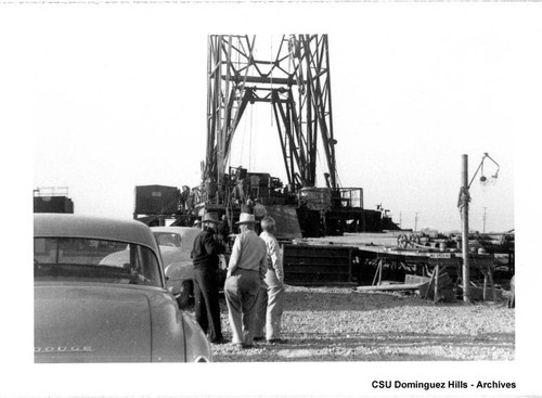 Men at oil well