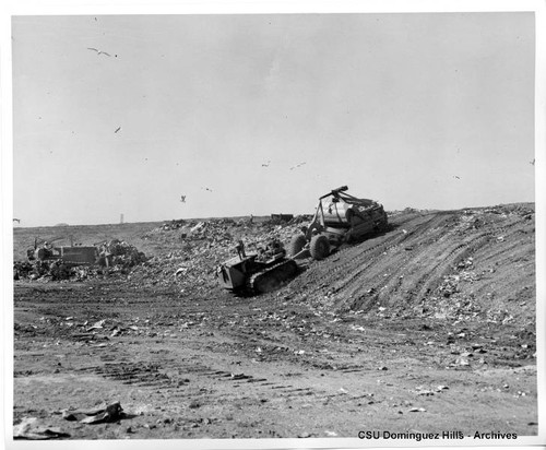 Bulldozers at dump site