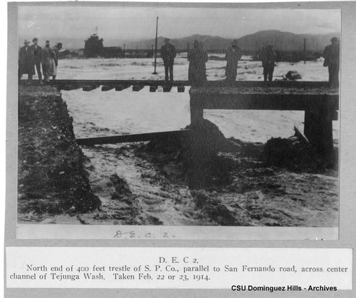 Weinberg Company vs. Bixby, et al; Defendant's Exhibit DEC-2; wrecked trestle over river