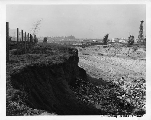 Oil well near trash dump